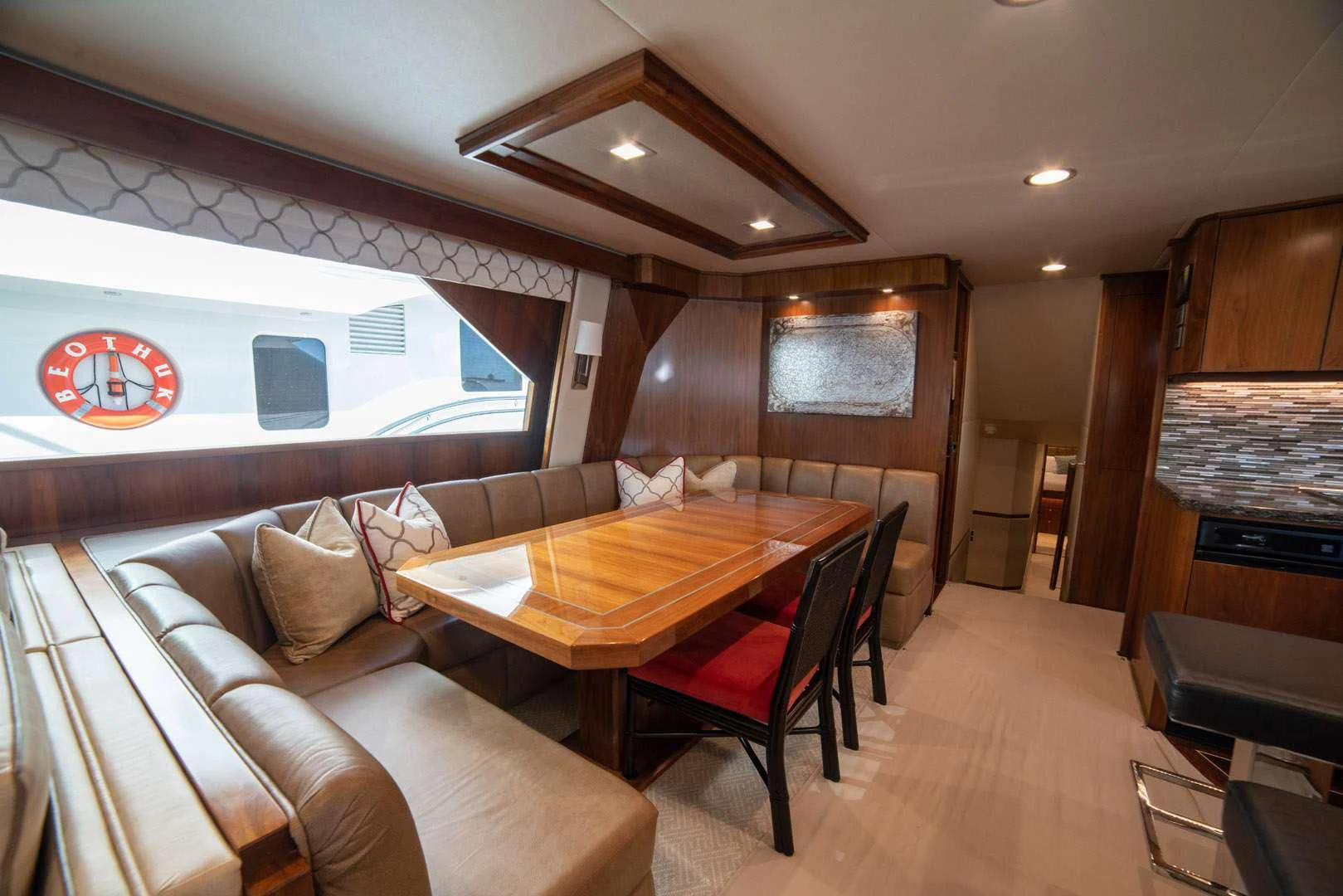a living room with a couch and a table aboard BELLA DONNA DI Yacht for Sale
