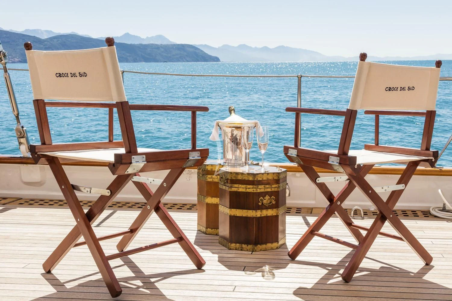 a group of chairs on a dock aboard CROCE DEL SUD Yacht for Sale