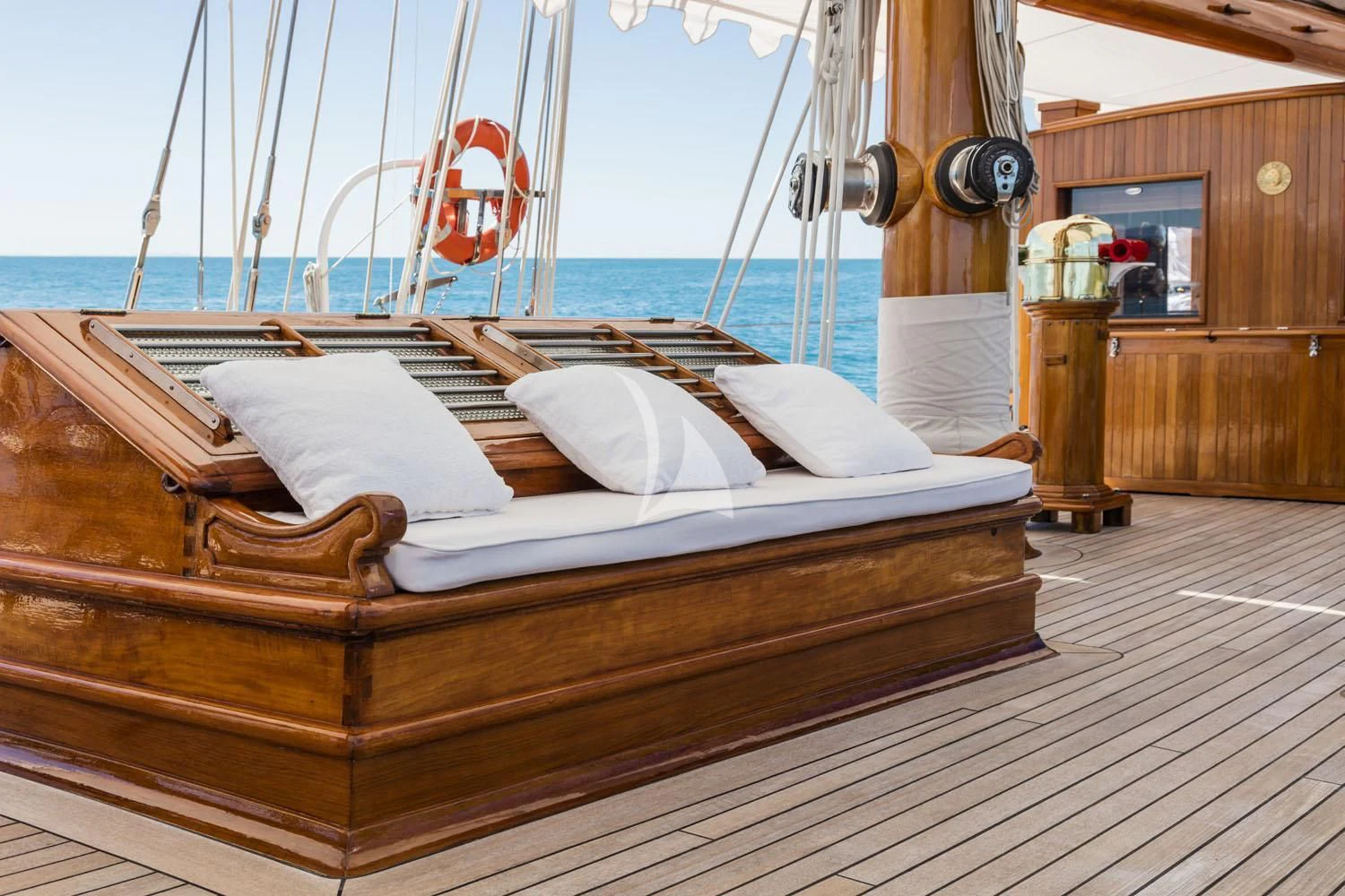 a bed on a deck aboard CROCE DEL SUD Yacht for Sale