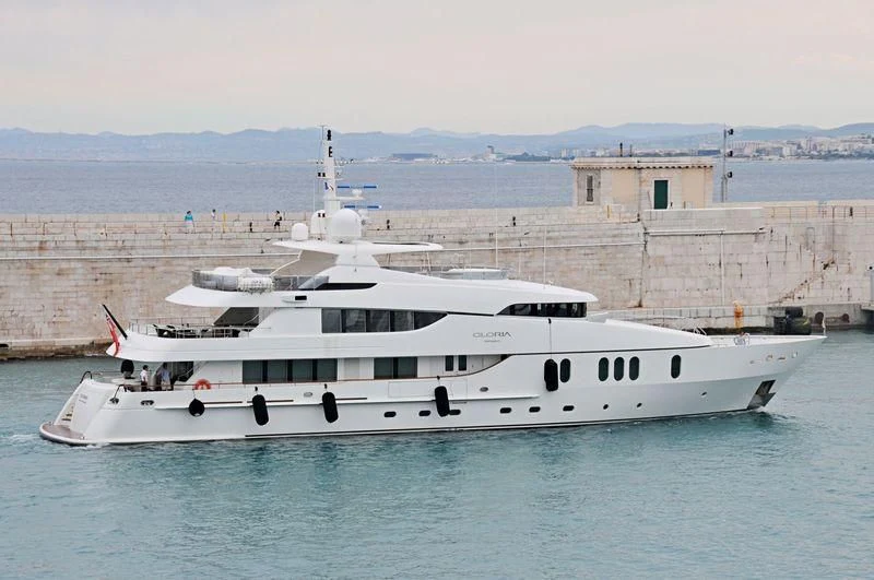 a large white boat in the water aboard GLORIA TERESA Yacht for Sale