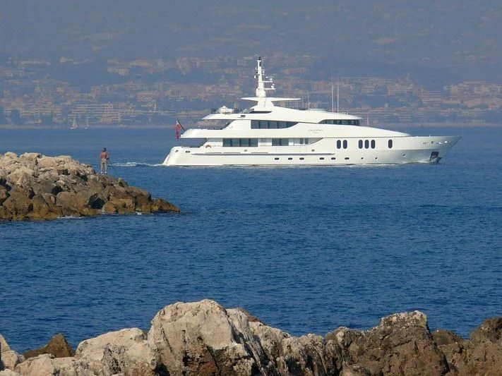 a white boat in the water aboard GLORIA TERESA Yacht for Sale
