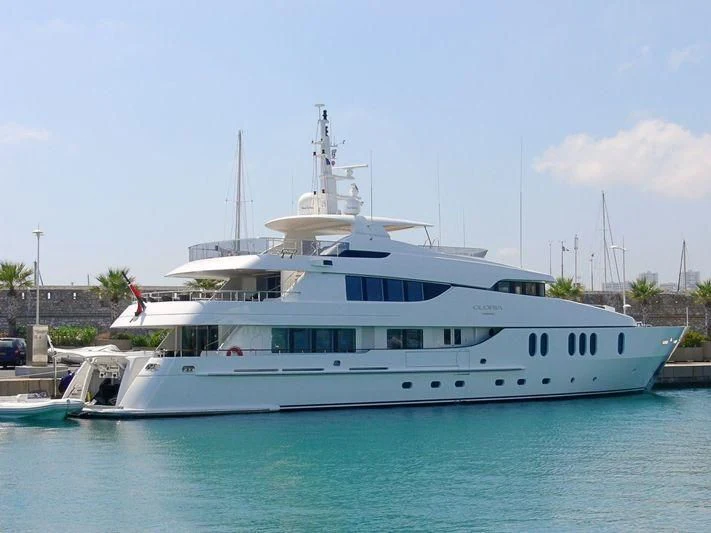 a large white boat in the water aboard GLORIA TERESA Yacht for Sale