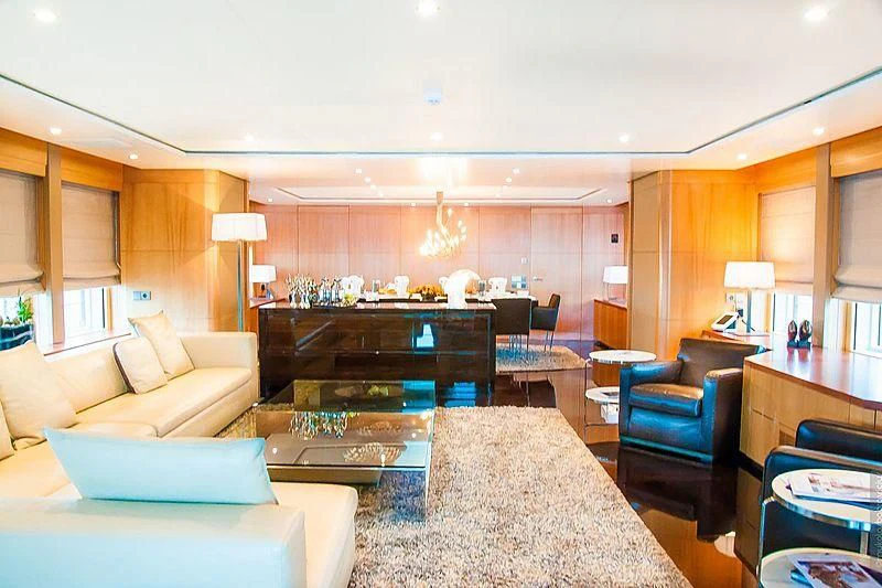 a living room with a fireplace aboard GLORIA TERESA Yacht for Sale
