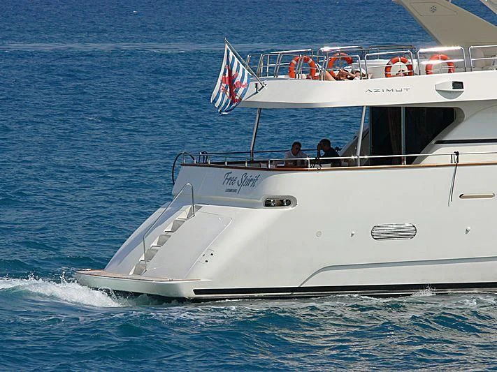 a boat with people on it aboard REFLECTION Yacht for Sale