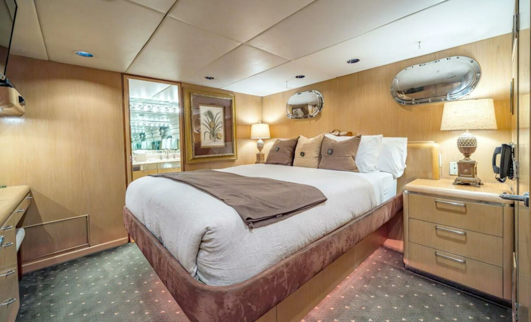 a large bed in a room aboard LE MONTRACHET Yacht for Sale