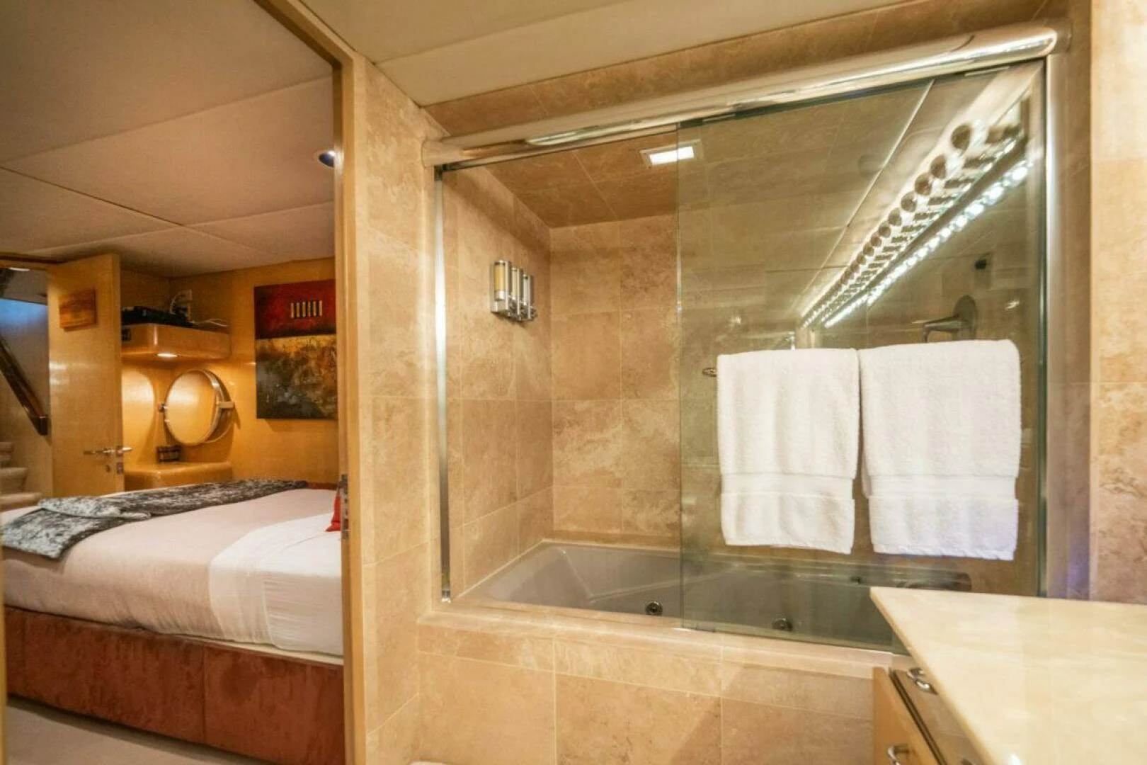 a bathroom with a glass shower aboard LE MONTRACHET Yacht for Sale