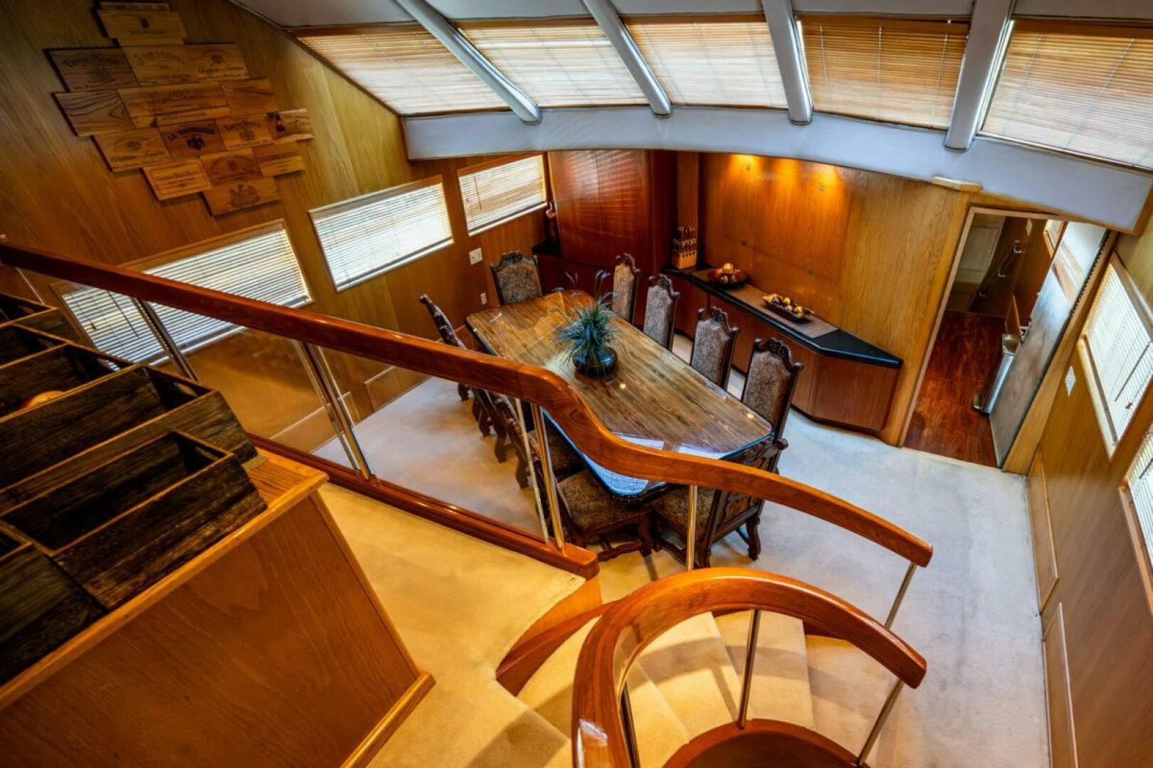 a large room with a table and chairs aboard LE MONTRACHET Yacht for Sale