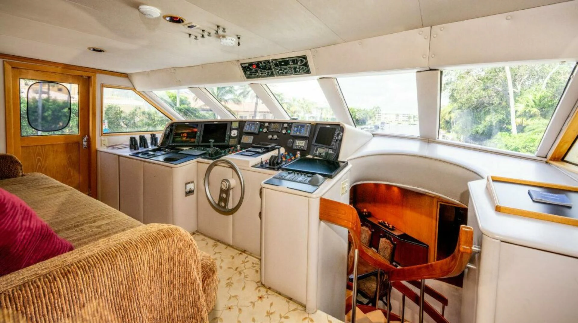 a small room with a bed and a small table aboard LE MONTRACHET Yacht for Sale