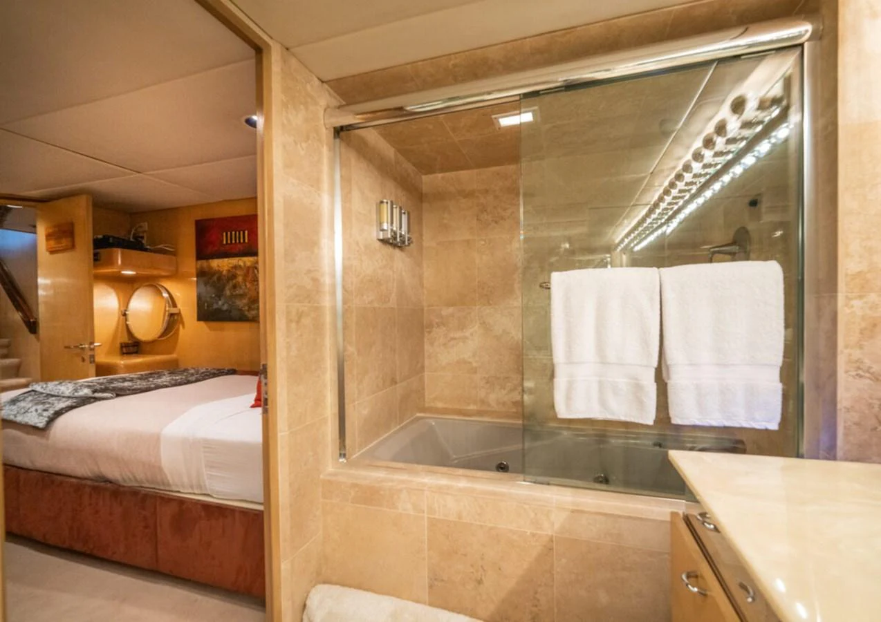 a bathroom with a glass shower aboard LE MONTRACHET Yacht for Sale