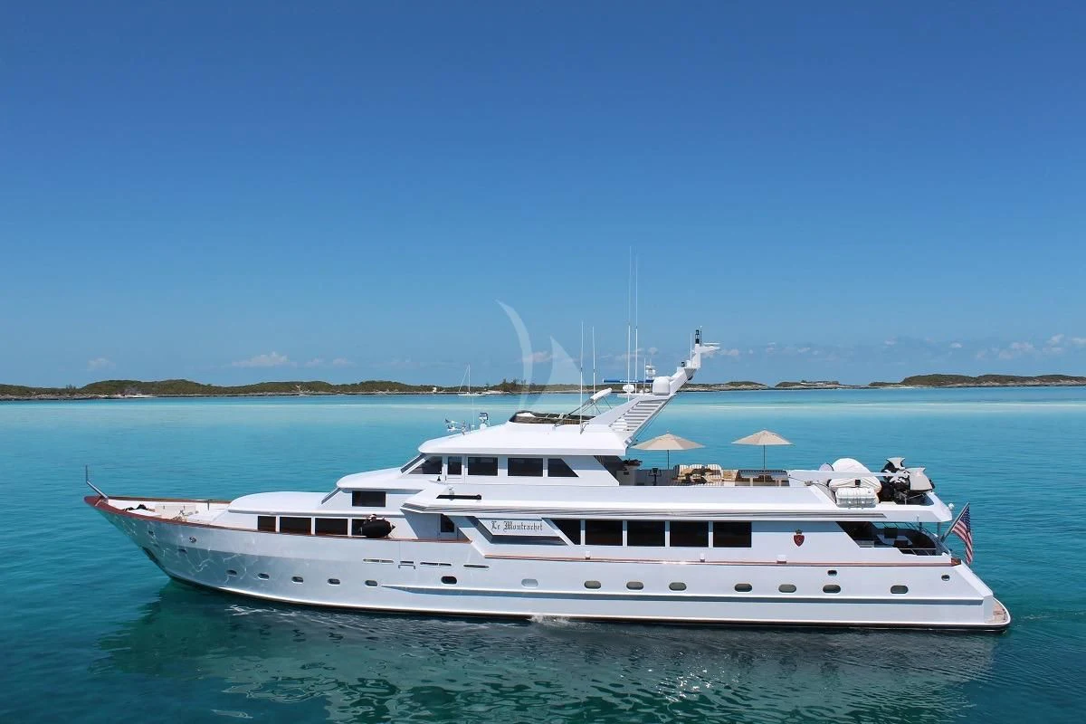a white yacht in the water aboard LE MONTRACHET Yacht for Sale