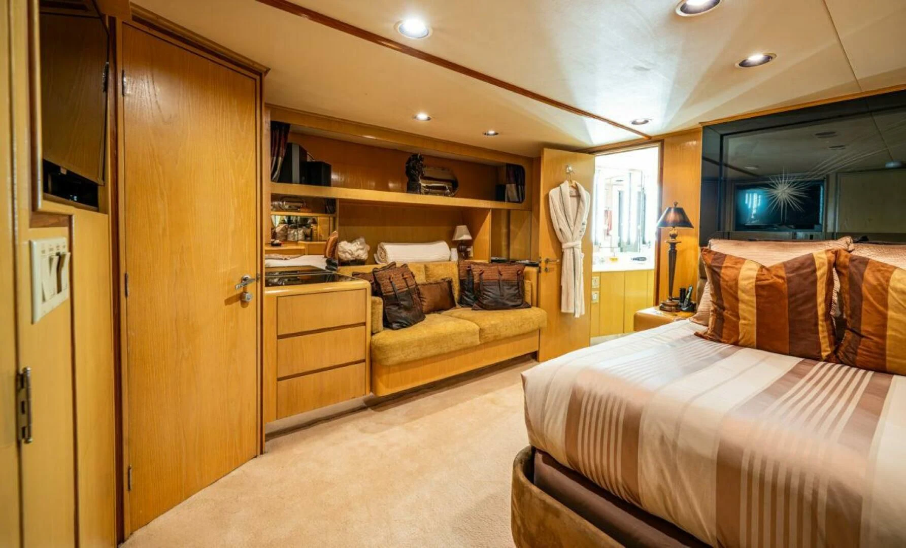 a bedroom with a closet and a bed aboard LE MONTRACHET Yacht for Sale