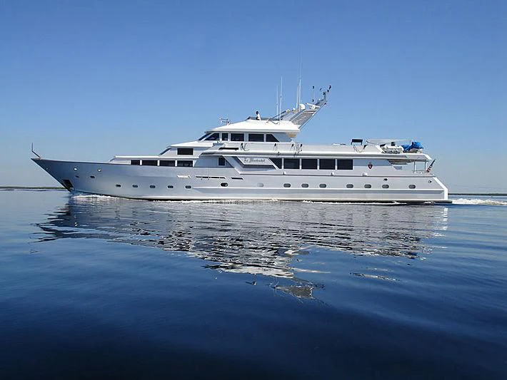 a white yacht in the water aboard LE MONTRACHET Yacht for Sale