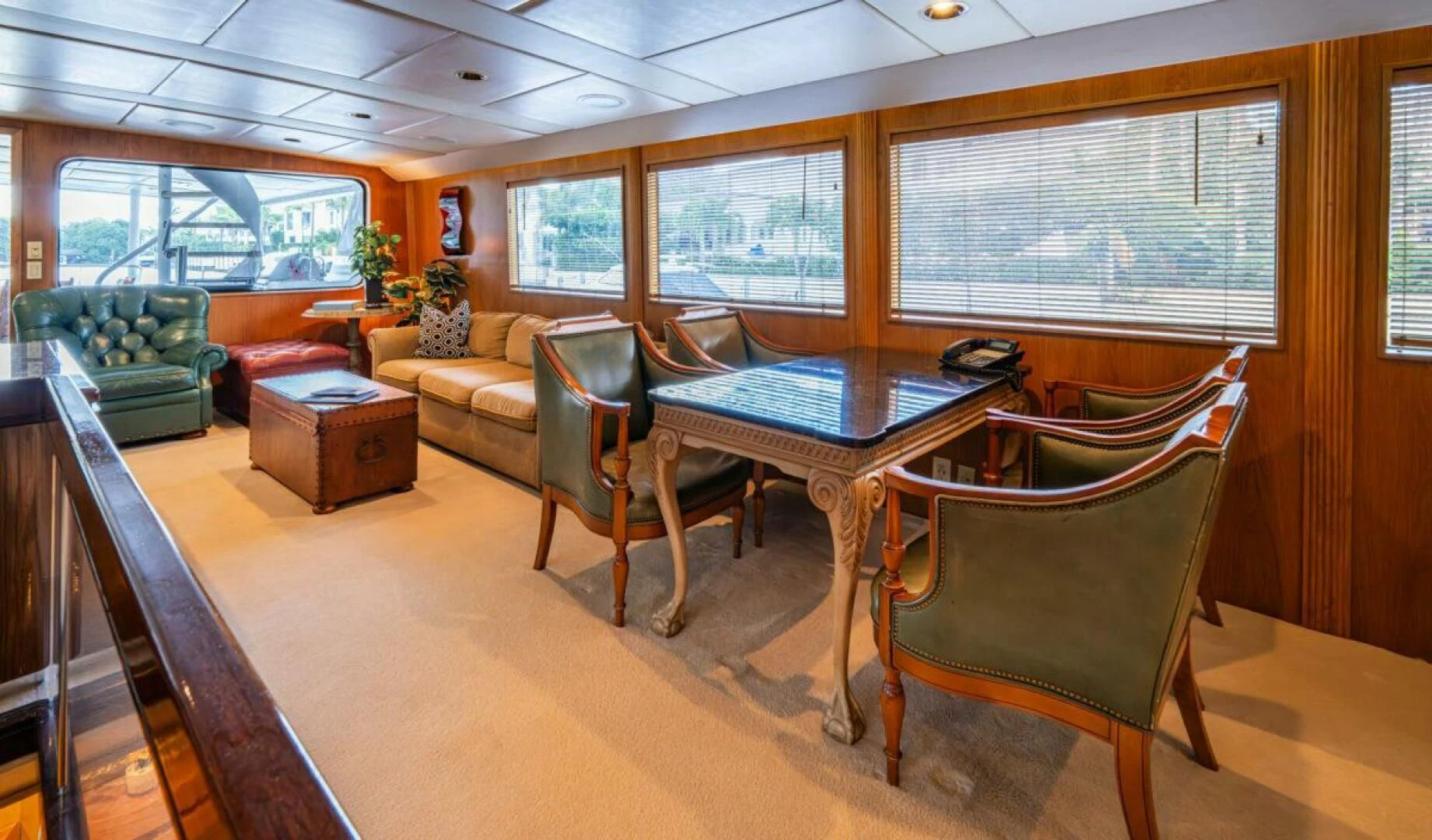 a room with a table and chairs aboard LE MONTRACHET Yacht for Sale