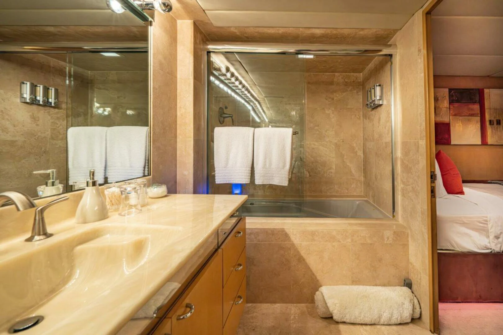 a bathroom with a large mirror aboard LE MONTRACHET Yacht for Sale