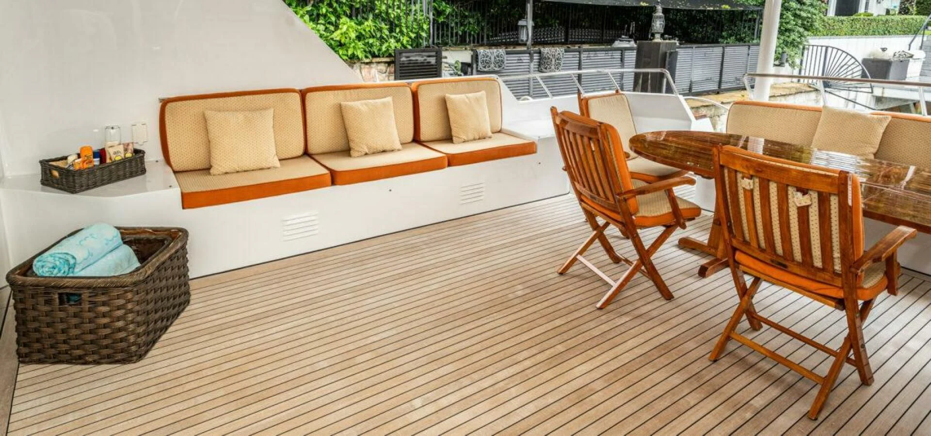 a patio with chairs and a couch aboard LE MONTRACHET Yacht for Sale