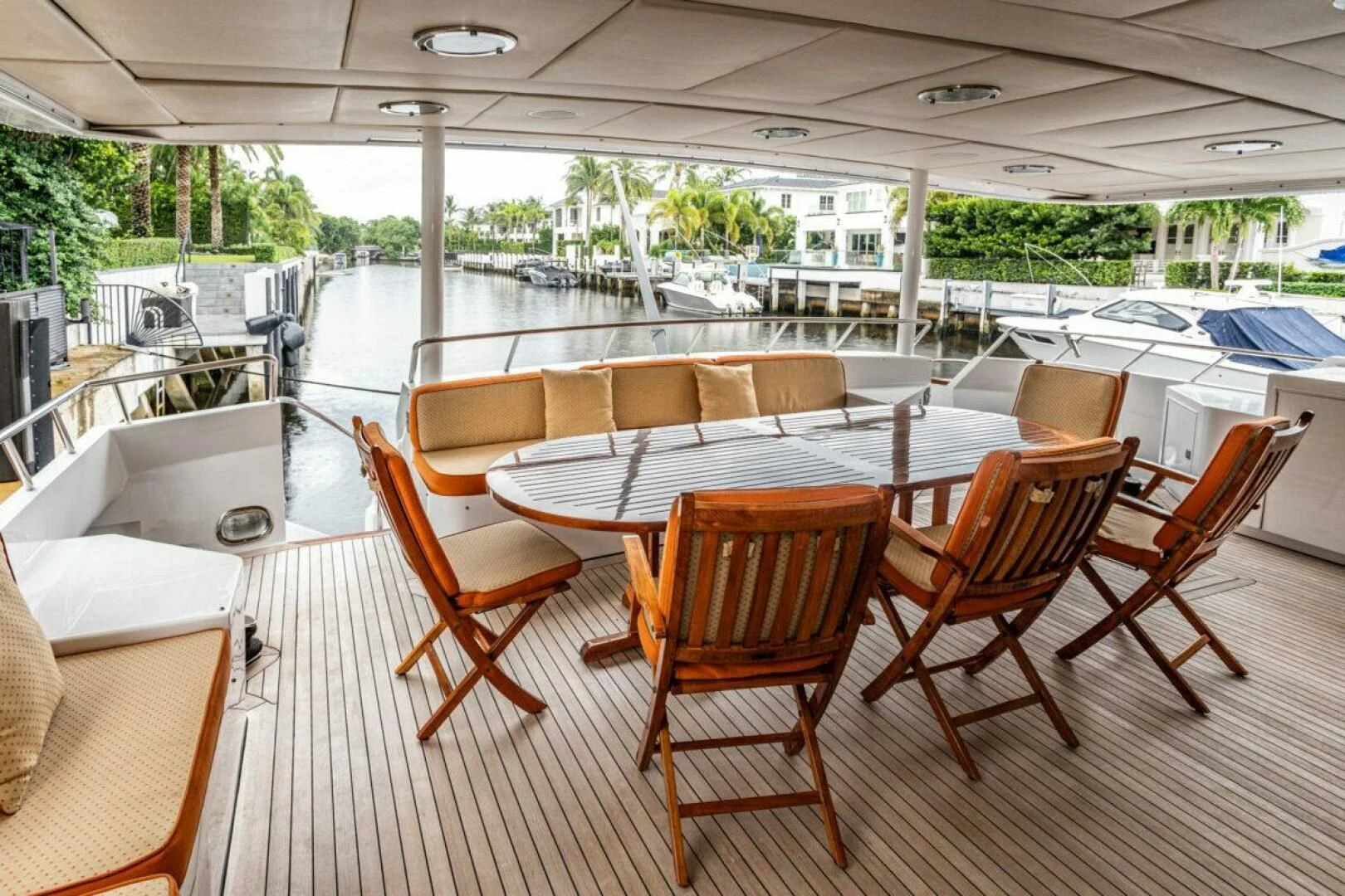 a room with a table and chairs aboard LE MONTRACHET Yacht for Sale