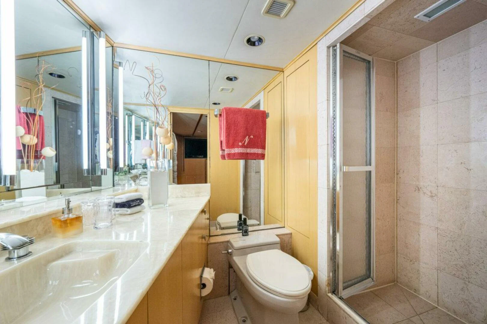 a bathroom with a sink toilet and a bathtub aboard LE MONTRACHET Yacht for Sale