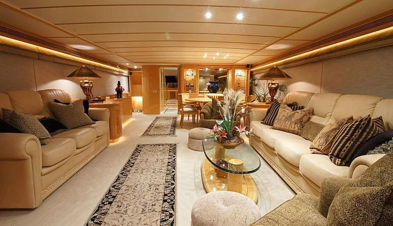 a living room with a large rug aboard POOR RICHARD Yacht for Sale