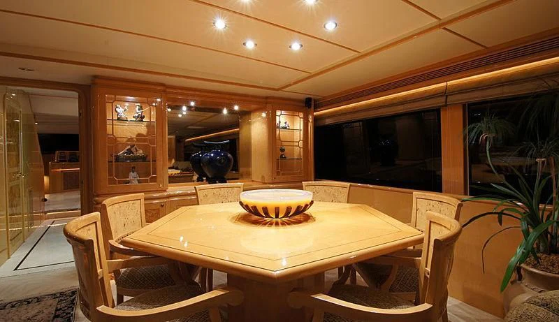 a table with a cake on it aboard POOR RICHARD Yacht for Sale