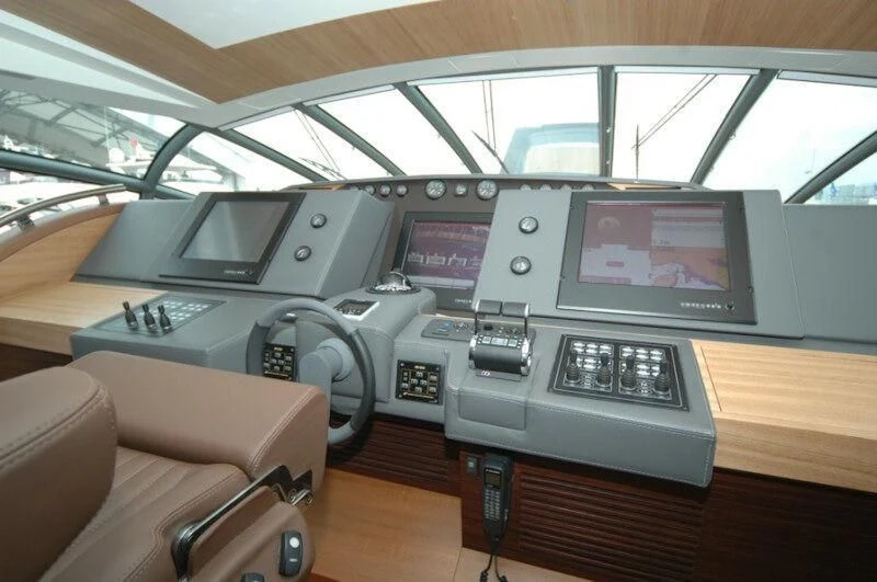 a vehicle with a screen and buttons aboard BLACK LEGEND Yacht for Sale