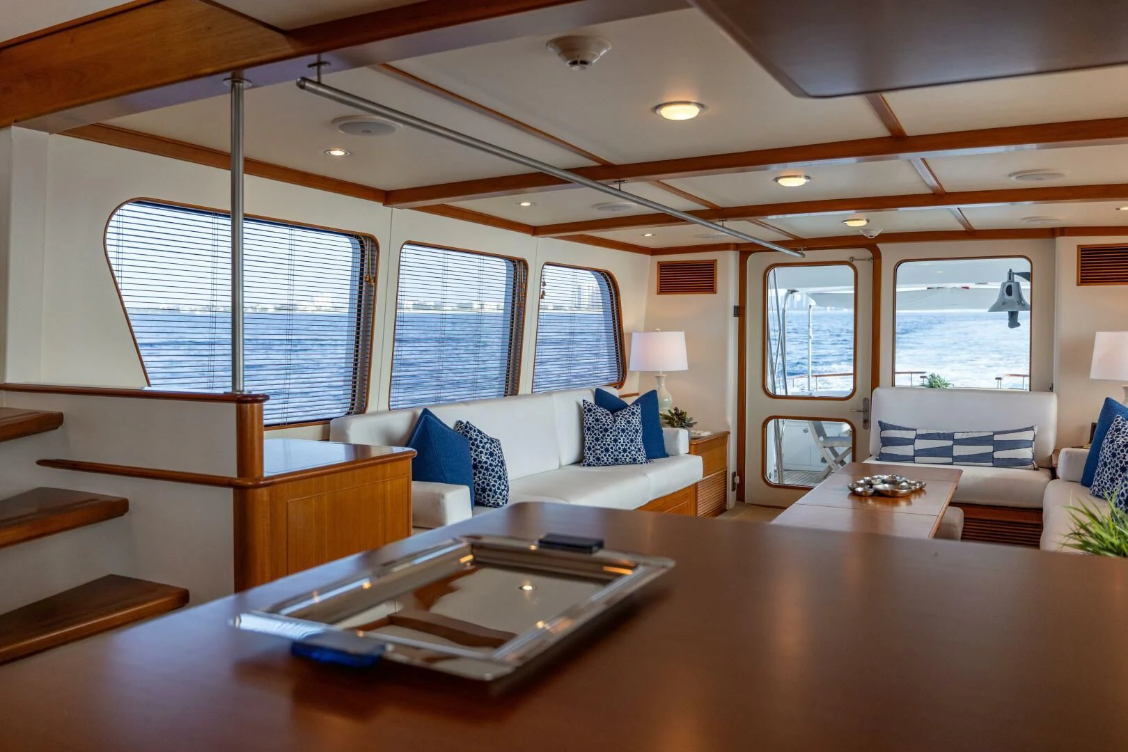 a living room with a large table aboard SEA BOLD Yacht for Sale