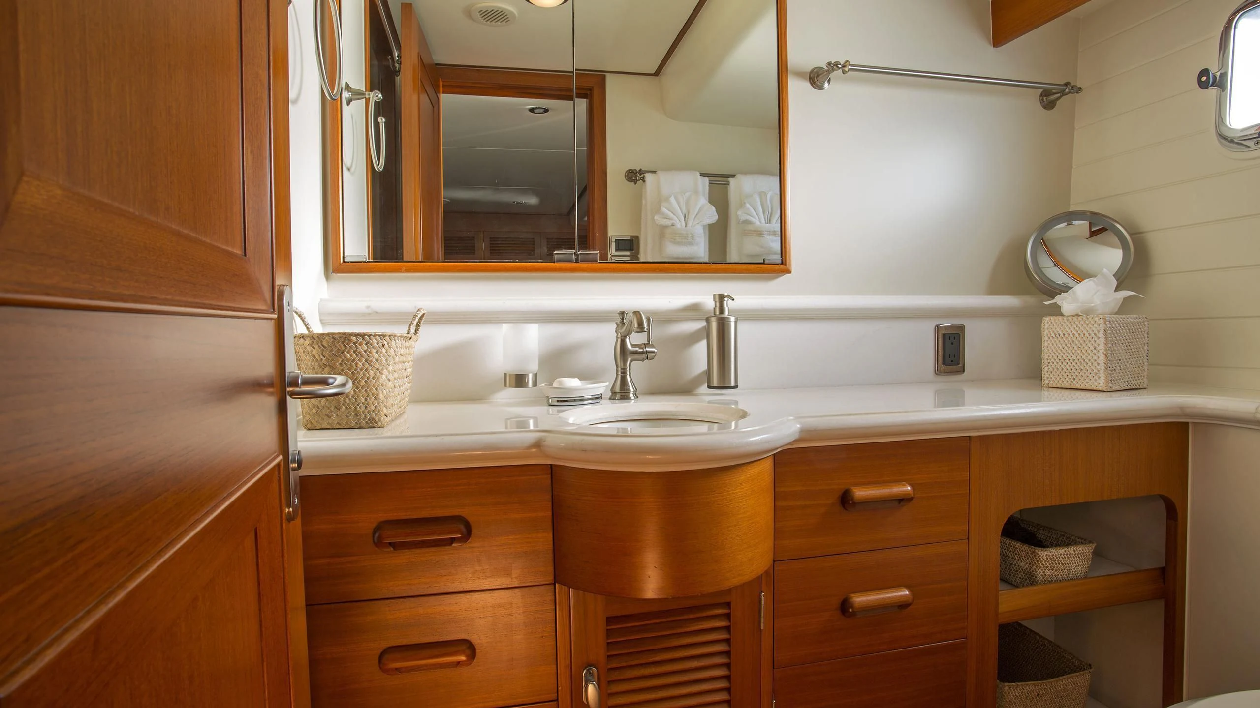 a bathroom with a mirror and a sink aboard SEA BOLD Yacht for Sale