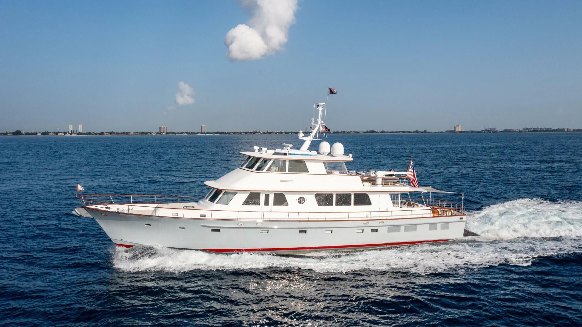 a white boat on the water aboard SEA BOLD Yacht for Sale