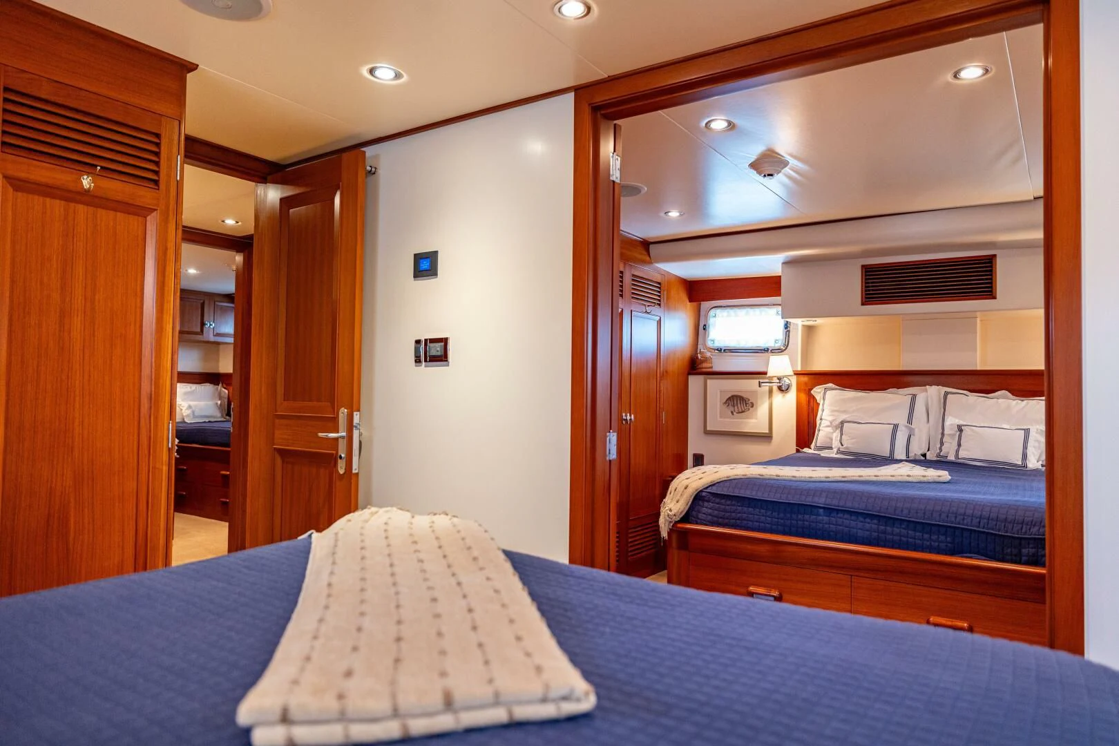 a bedroom with a couple of beds aboard SEA BOLD Yacht for Sale