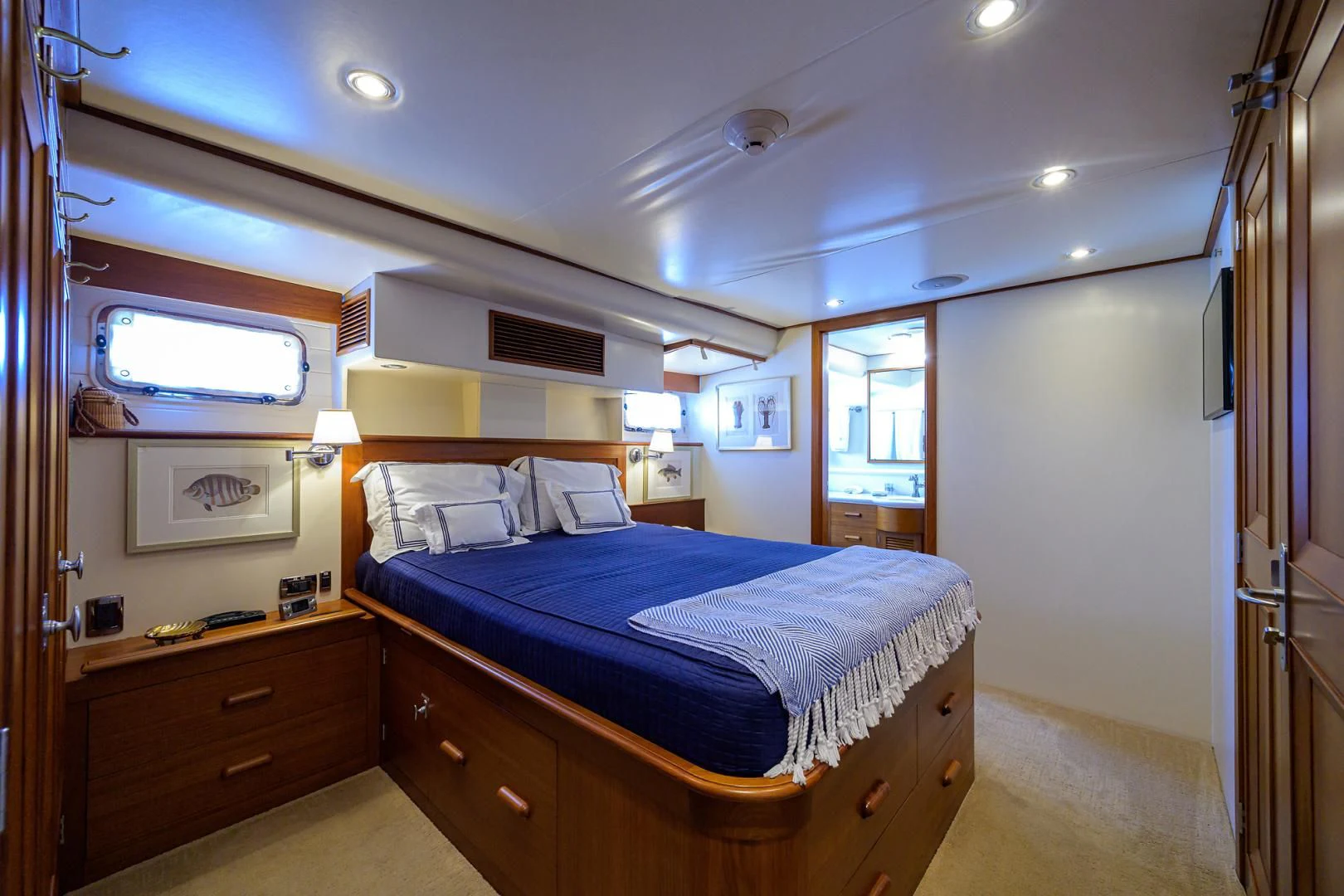 a bedroom with a bed and a window aboard SEA BOLD Yacht for Sale