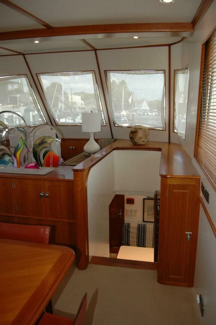 a room with a desk and a window aboard SEA BOLD Yacht for Sale