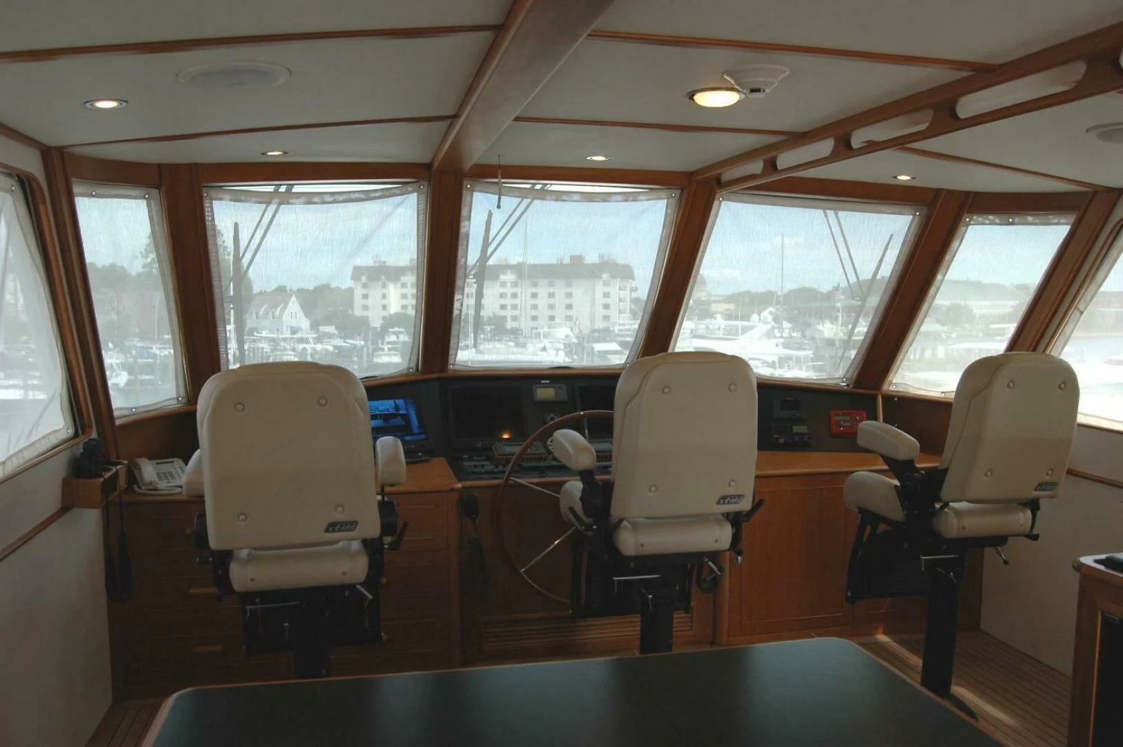 a room with a table and chairs aboard SEA BOLD Yacht for Sale