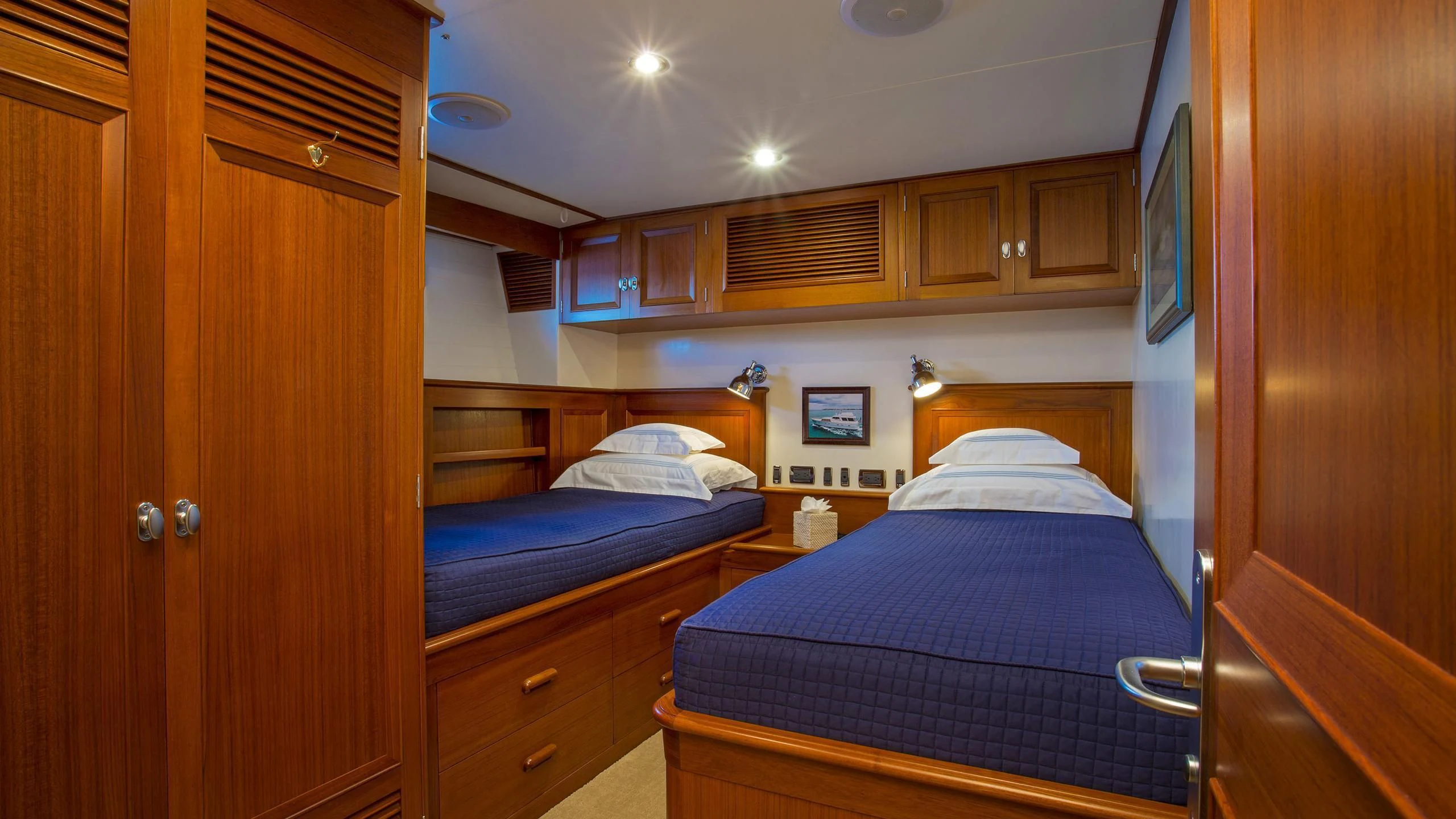 a bedroom with two beds aboard SEA BOLD Yacht for Sale