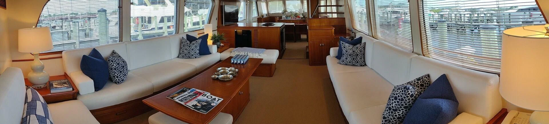 a living room with a white couch and a coffee table aboard SEA BOLD Yacht for Sale