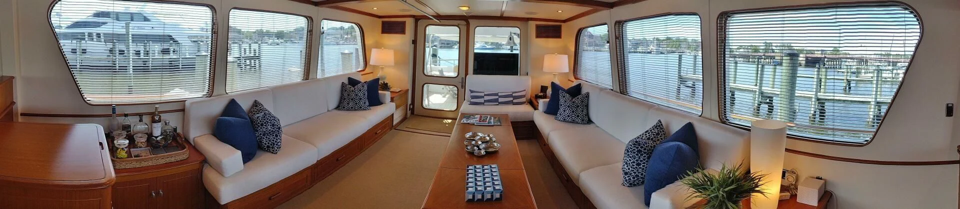 a living room with a large window aboard SEA BOLD Yacht for Sale