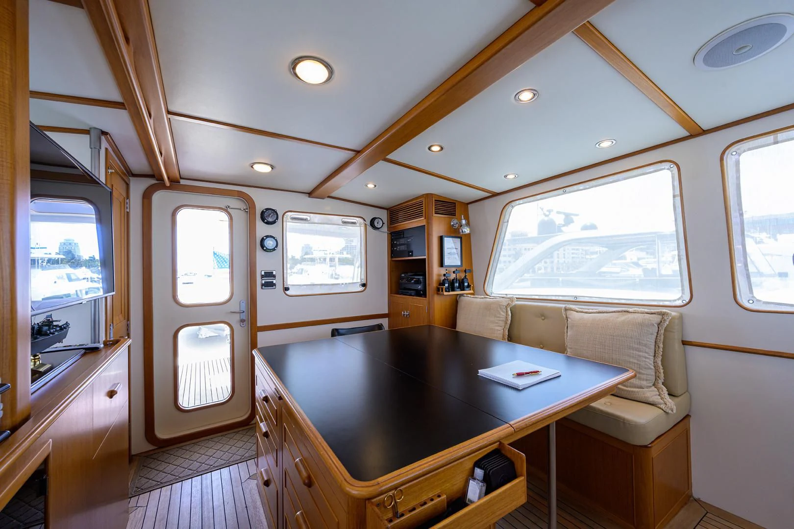 a small living room with a table aboard SEA BOLD Yacht for Sale