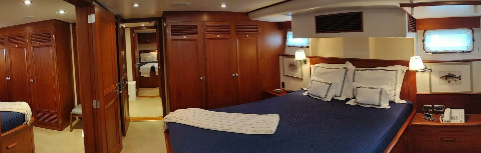 a room with a bed and a television aboard SEA BOLD Yacht for Sale