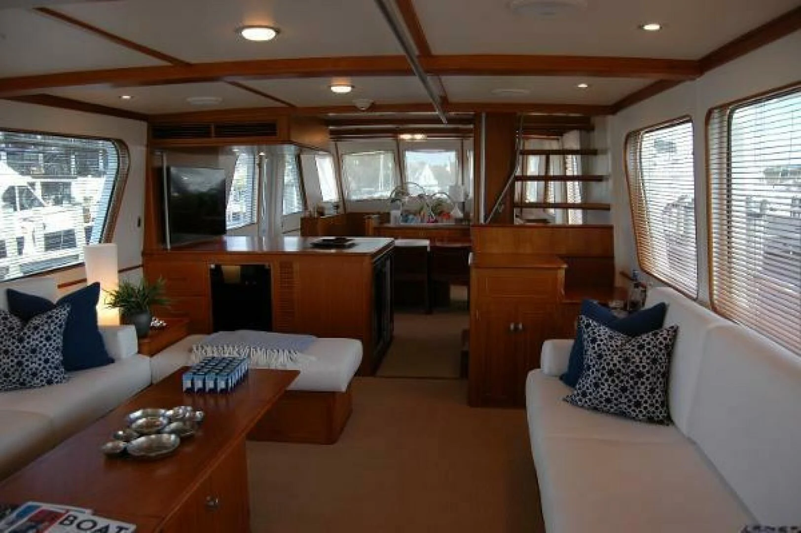 a living room with a couch and a table aboard SEA BOLD Yacht for Sale
