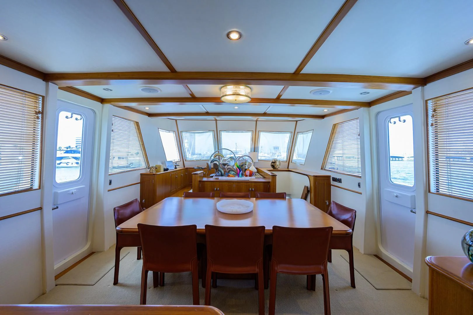 a dining room with a table and chairs aboard SEA BOLD Yacht for Sale