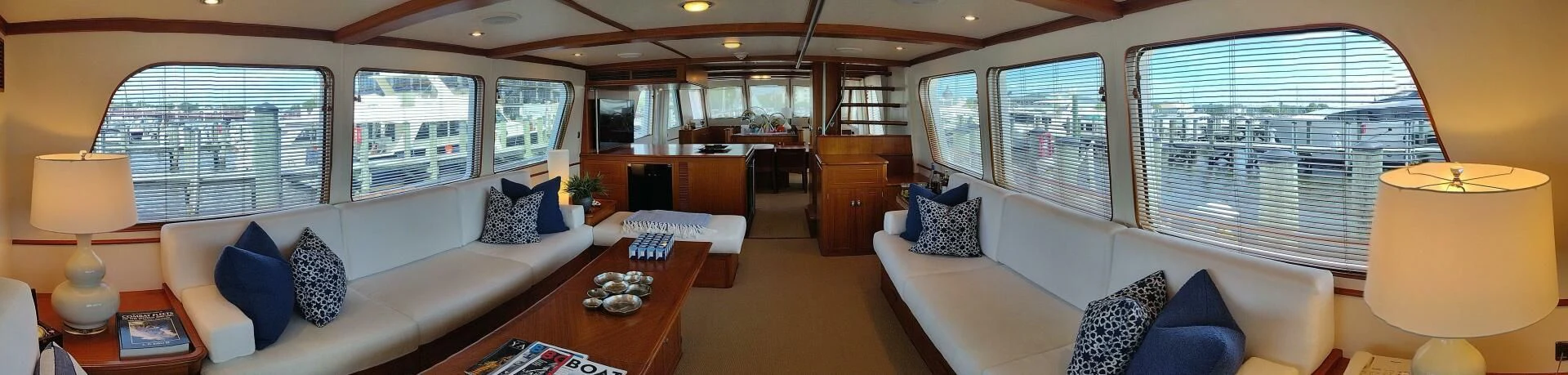 a living room with a large window aboard SEA BOLD Yacht for Sale
