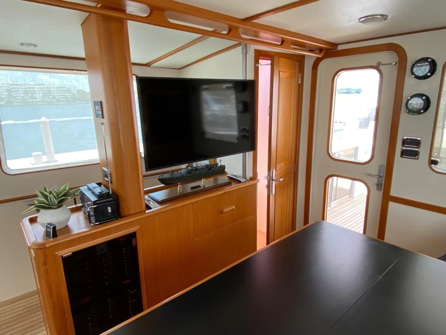 a room with a desk and a television aboard SEA BOLD Yacht for Sale