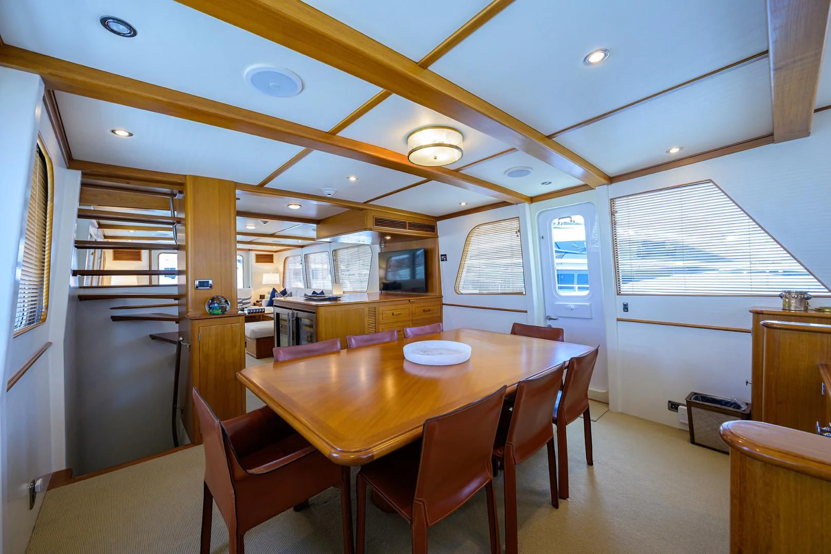 a kitchen with a table and chairs aboard SEA BOLD Yacht for Sale