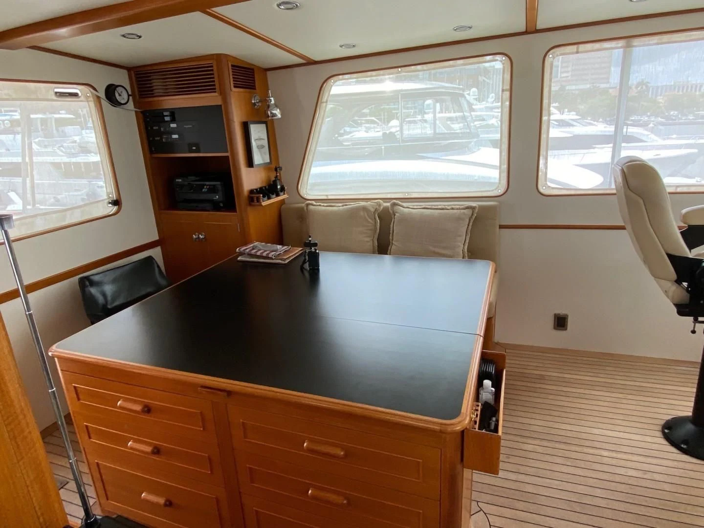a room with a table and a couch aboard SEA BOLD Yacht for Sale