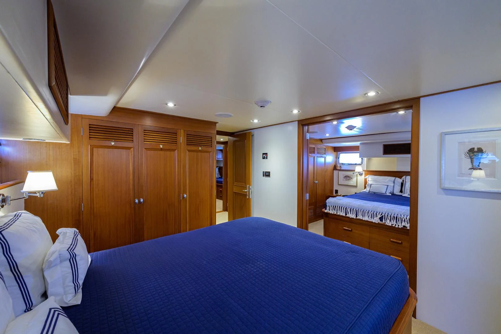 a bedroom with a large mirror aboard SEA BOLD Yacht for Sale