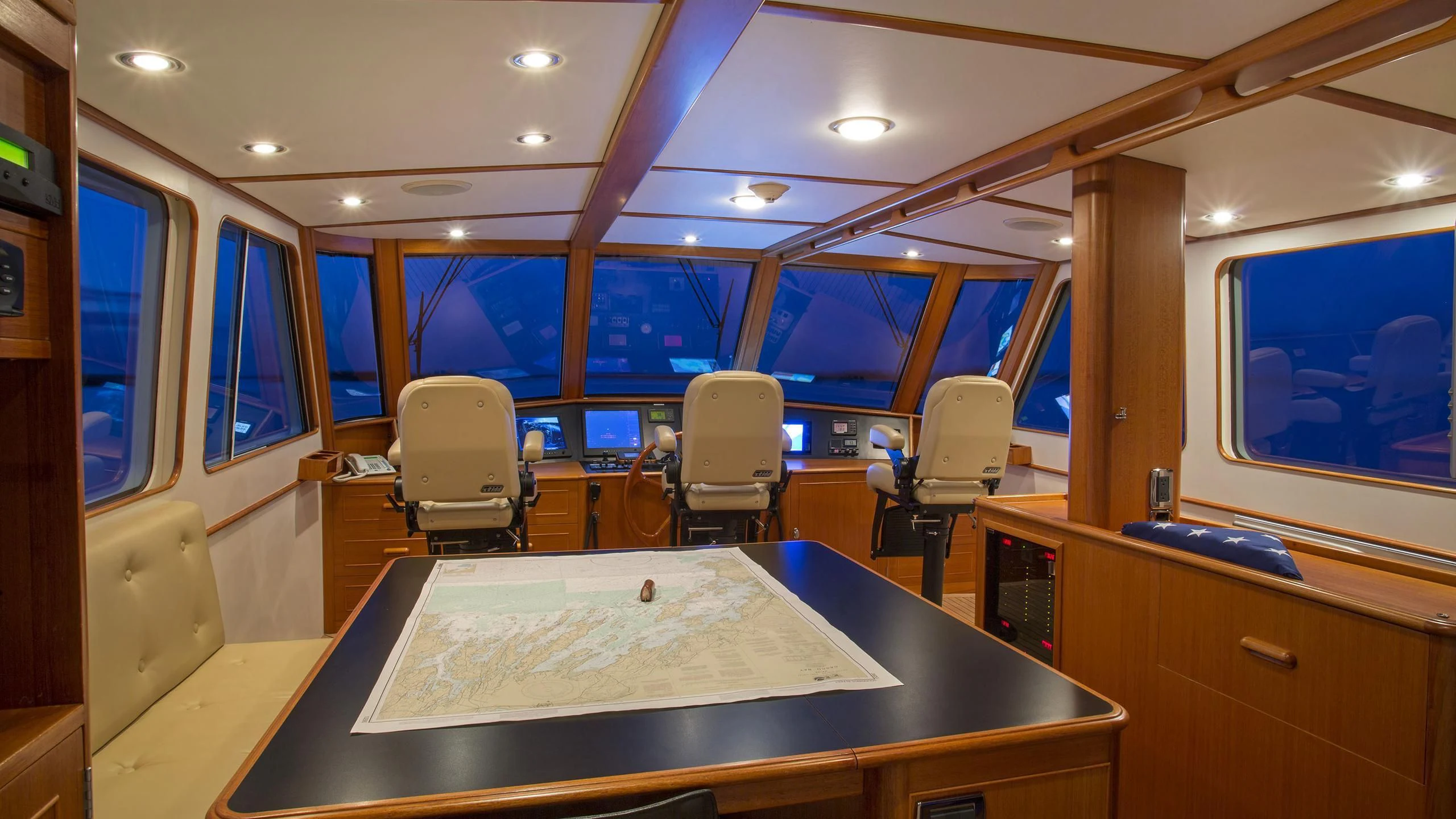 a room with a table and chairs aboard SEA BOLD Yacht for Sale