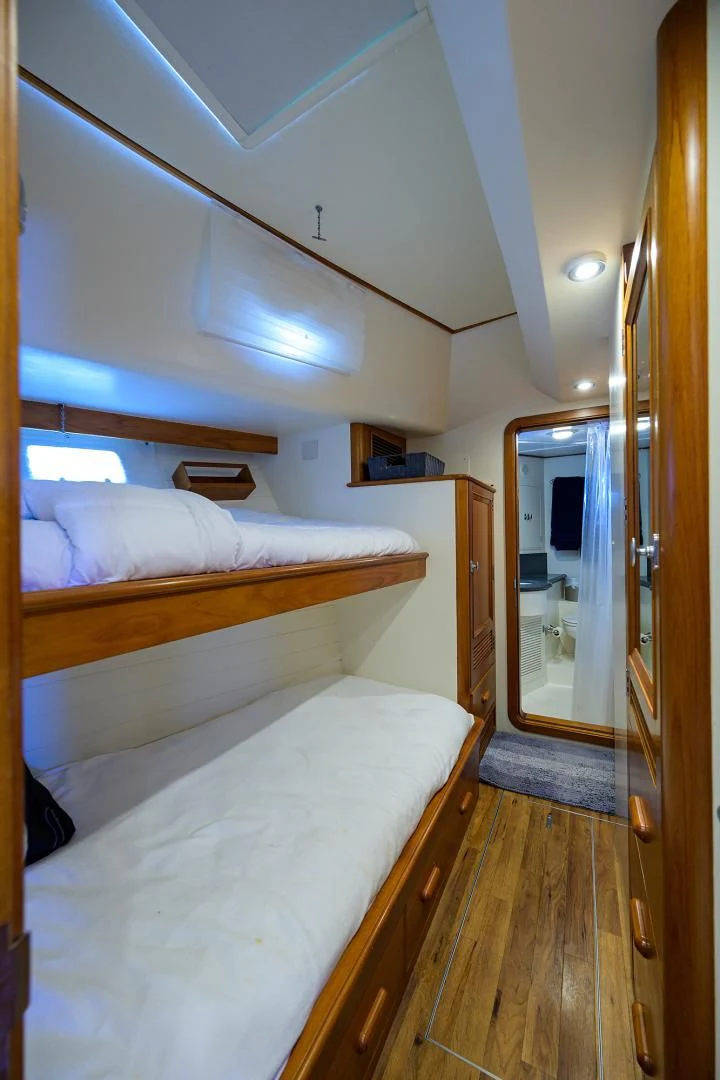 a room with two beds aboard SEA BOLD Yacht for Sale