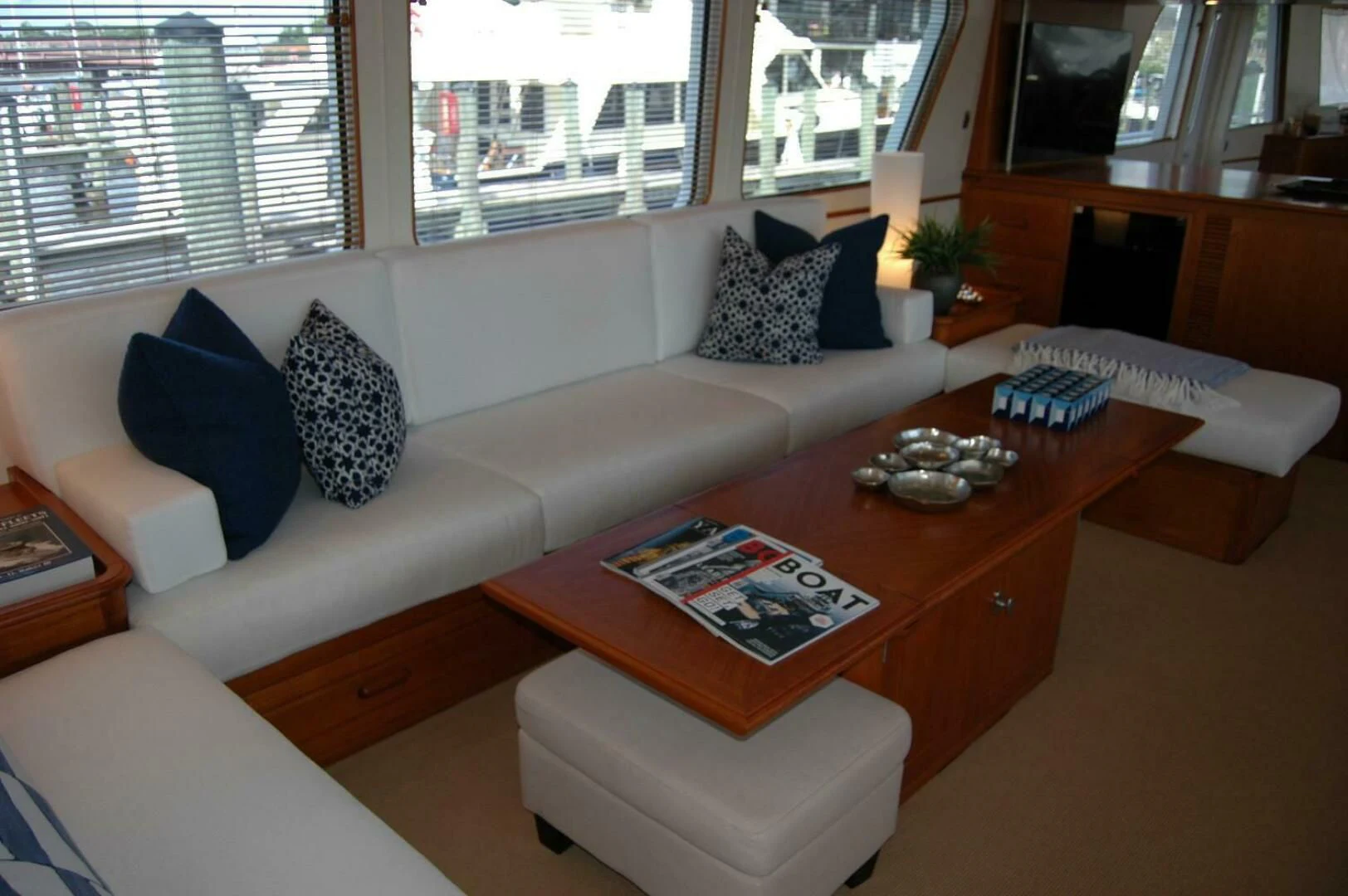 a living room with a couch and a coffee table aboard SEA BOLD Yacht for Sale