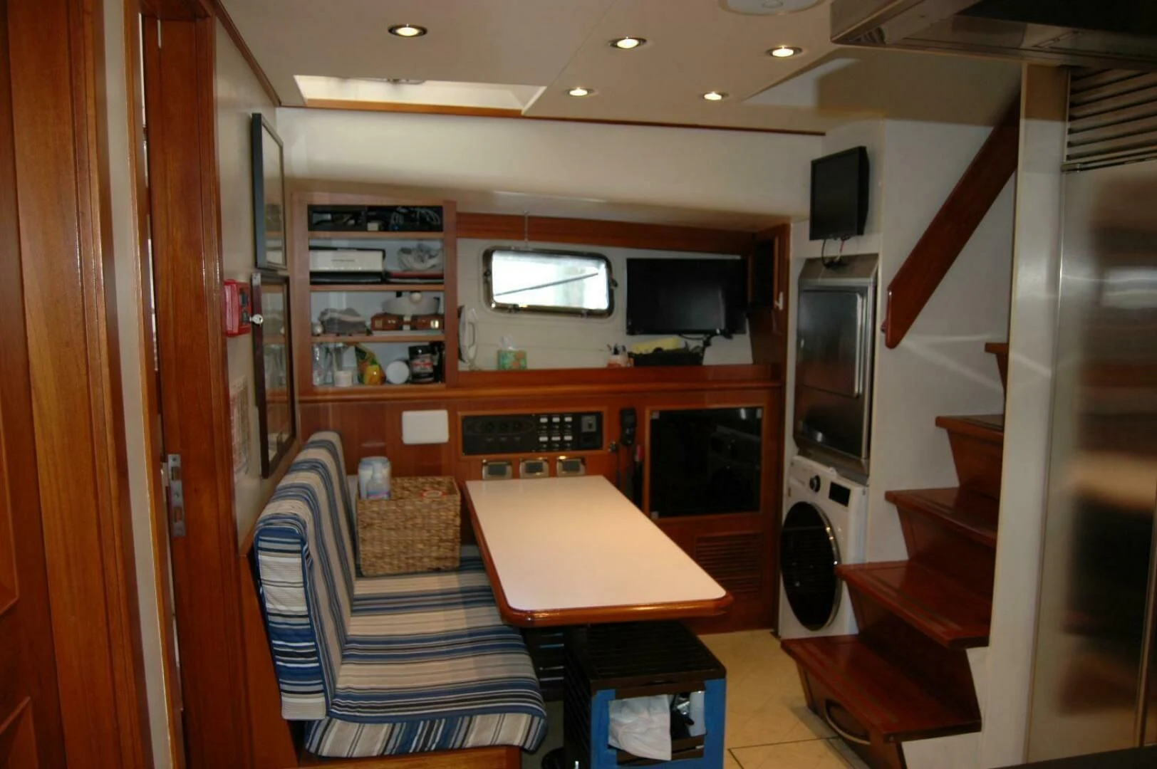 a room with a table and chairs aboard SEA BOLD Yacht for Sale