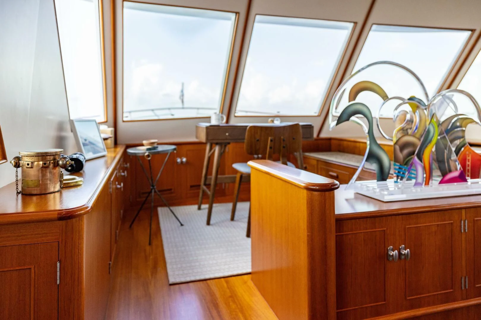 a kitchen with a table and chairs aboard SEA BOLD Yacht for Sale