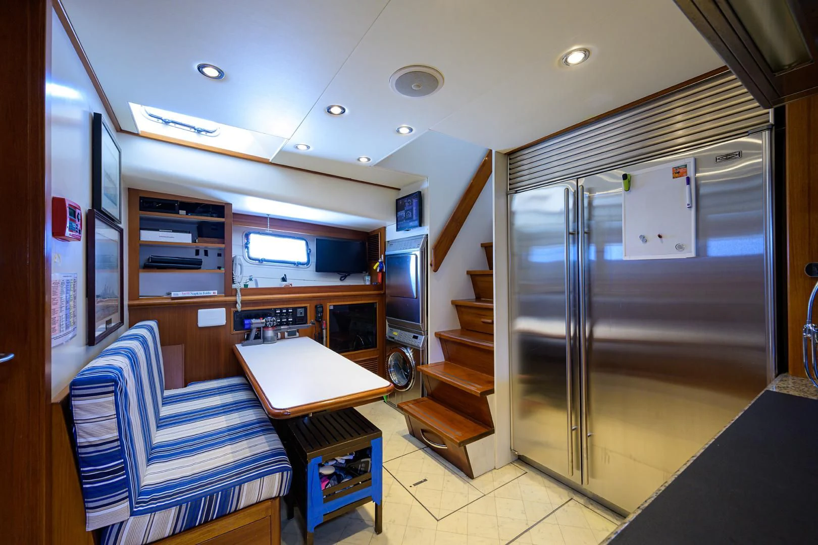 a room with a bed and a desk aboard SEA BOLD Yacht for Sale