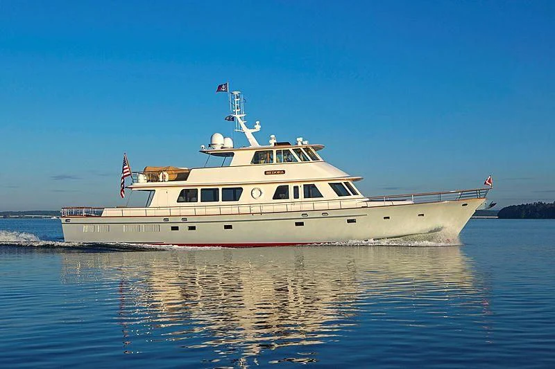 a large white ship on the water aboard SEA BOLD Yacht for Sale